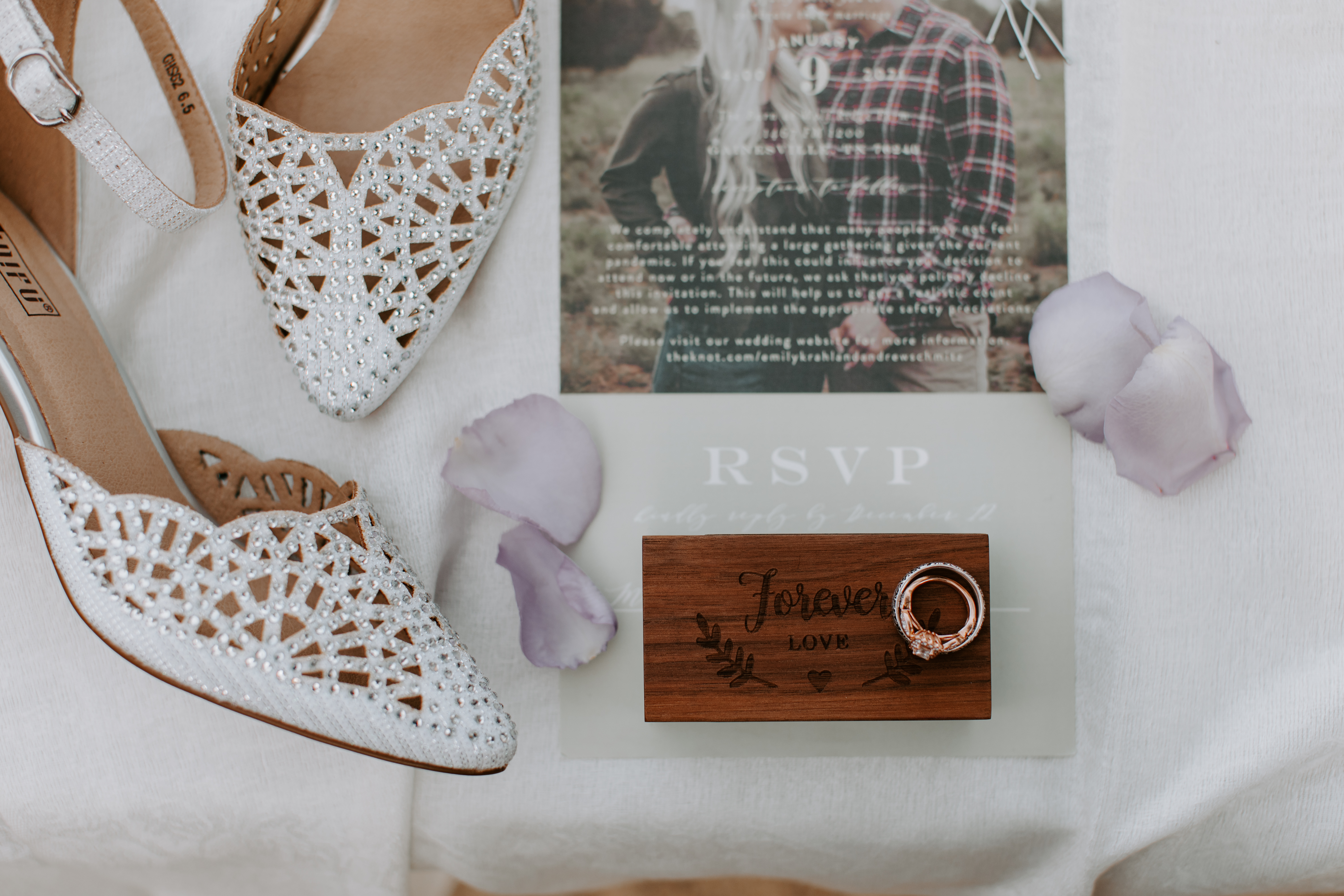 wedding flatlay shoes rings invitations